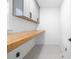 Bright office space featuring modern geometric tile floor and floating wooden desk at 4808 Cobble Glen Way, Charlotte, NC 28269