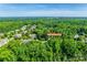 Aerial shot of a lush neighborhood with a home identified at 5008 Woodview Ln at 5008 Woodview Ln, Weddington, NC 28104