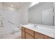 Bright bathroom with combination shower and tub with updated vanity at 5008 Woodview Ln, Weddington, NC 28104