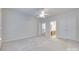 Neutral bedroom featuring plush carpet, a ceiling fan, and access to a bathroom and walk-in closet at 5008 Woodview Ln, Weddington, NC 28104