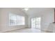Bright dining room with sliding glass doors that let in natural light and provide access to the patio at 5008 Woodview Ln, Weddington, NC 28104