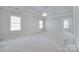 Bright, spacious main bedroom features tray ceilings, fresh paint, and plenty of natural light at 5008 Woodview Ln, Weddington, NC 28104