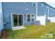 Backyard with a well-maintained lawn and private patio area at 508 Tayberry Ln, Fort Mill, SC 29715