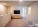 A versatile bonus room with plush carpeting, perfect for relaxation or entertainment at 508 Tayberry Ln, Fort Mill, SC 29715