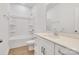 A bright bathroom featuring a white vanity, a shower and bathtub combo, and modern fixtures at 5175 Grand Canyon Rd, Concord, NC 28027