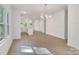 Open living space with modern lighting, neutral walls, and an airy, inviting atmosphere at 5175 Grand Canyon Rd, Concord, NC 28027