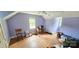 Spacious bedroom with hardwood floors, natural light, and a ceiling fan provides a comfortable atmosphere at 600 College Ave, Rock Hill, SC 29730