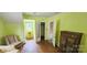Bedroom with a light green walls and a closet and seating area on one side at 600 College Ave, Rock Hill, SC 29730