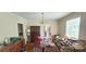 Dining room featuring hardwood floors, a chandelier, and two windows at 600 College Ave, Rock Hill, SC 29730