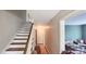 Hallway leading to a second story, with an open sitting room on one side at 600 College Ave, Rock Hill, SC 29730