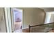 Hallway with hardwood floors leading to a light-filled bedroom, enhancing the home's charm at 600 College Ave, Rock Hill, SC 29730