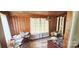 Sitting room featuring wood paneling and decorative columns at 600 College Ave, Rock Hill, SC 29730