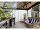 Outdoor sink with grill, counter space, and a quaint patio set at 6103 Warrior Ave, Fort Mill, SC 29707