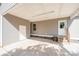 Spacious carport with concrete floor and access doors at 613 Gold Hill Dr, Salisbury, NC 28146