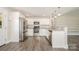 Well-equipped kitchen with stainless steel appliances, white cabinetry and a breakfast bar at 613 Gold Hill Dr, Salisbury, NC 28146
