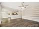 Bright and airy living room boasting vaulted ceilings, wood floors, and custom shelving at 613 Gold Hill Dr, Salisbury, NC 28146