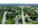 Scenic aerial view displaying the property, the surrounding neighborhood, and a cityscape in the distance at 626 1St Se Ave, Hickory, NC 28602