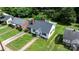 Aerial shot showcasing the home and its landscaped front yard, with other houses nearby at 626 1St Se Ave, Hickory, NC 28602