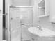 Bathroom featuring a vanity sink and a shower with glass doors at 626 1St Se Ave, Hickory, NC 28602