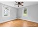 Bedroom features hardwood floors, neutral walls, and natural lighting at 626 1St Se Ave, Hickory, NC 28602