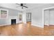 Spacious living room boasts hardwood floors, a fireplace, and neutral paint at 626 1St Se Ave, Hickory, NC 28602
