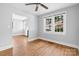 Bright living room with hardwood floors, neutral paint, and large windows at 626 1St Se Ave, Hickory, NC 28602