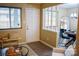 Entryway with a white door, a small bench, decorative pillows, artwork, and a decorative rug at 7526 Holly Grove Ct, Charlotte, NC 28227