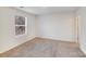 Comfortable bedroom with soft carpeting, natural light, and a calming atmosphere at 834 N Flint St, Lincolnton, NC 28092