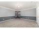 Spacious bedroom featuring plush carpets, neutral gray paint and large windows for natural light at 1002 Hollyhedge Ln, Indian Trail, NC 28079