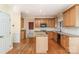 Updated kitchen featuring granite countertops, island, and stainless steel appliances at 1002 Hollyhedge Ln, Indian Trail, NC 28079