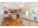 Cozy kitchen boasts stainless steel appliances, granite countertops, and a functional island at 1002 Hollyhedge Ln, Indian Trail, NC 28079