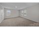 Neutral bedroom with carpeted floors and natural light from windows at 1011 Rachel Ln, Salisbury, NC 28147