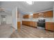 Traditional kitchen featuring wood cabinets, stainless steel appliances, and hardwood flooring at 1011 Rachel Ln, Salisbury, NC 28147