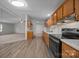 Well-lit kitchen with modern appliances, ample counter space, and wood cabinetry at 1011 Rachel Ln, Salisbury, NC 28147