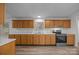 Bright kitchen featuring wood cabinets, stainless steel appliances, and hardwood flooring at 1011 Rachel Ln, Salisbury, NC 28147