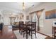 Open dining area with a view to the kitchen, and living room at 1012 Laparc Ln, Indian Trail, NC 28079