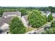 Overhead view of home nestled among mature trees in a charming neighborhood at 1012 Laparc Ln, Indian Trail, NC 28079