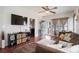 Comfortable living room with hardwood floors, a sectional sofa, and view of other rooms at 1012 Laparc Ln, Indian Trail, NC 28079