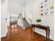 Elegant foyer with hardwood floors, high ceilings, staircase, and decorative accents at 10321 Lemington Dr, Mint Hill, NC 28227