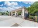 Community pool house area offers shade and seating next to the fenced-in pool at 10321 Lemington Dr, Mint Hill, NC 28227