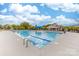 Large, inviting community pool featuring crystal-clear water and plenty of lounge chairs for relaxation at 10321 Lemington Dr, Mint Hill, NC 28227