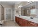 Bathroom featuring double sinks and vanities, and a glass enclosed shower and tub at 126 Northbridge Dr, Mooresville, NC 28115