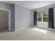 Bedroom with neutral walls, carpet, and natural light at 126 Northbridge Dr, Mooresville, NC 28115