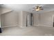 Spacious bedroom with neutral tones, carpeted floors, and ceiling fan, ideal for relaxation and rest at 126 Northbridge Dr, Mooresville, NC 28115