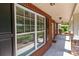 Inviting front porch showcasing brick accents, a covered entrance, and exterior lighting at 126 Northbridge Dr, Mooresville, NC 28115