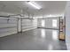 Spacious three-car garage with ample storage space, providing convenience and organization for vehicles and tools at 126 Northbridge Dr, Mooresville, NC 28115