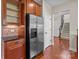 This kitchen boasts stainless steel refrigerator and plenty of cabinet space near the hallway at 126 Northbridge Dr, Mooresville, NC 28115