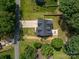 An aerial view showcasing the home's layout, backyard, and the surrounding landscape and neighborhood at 140 Robin Rd, Lincolnton, NC 28092