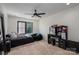 Bedroom with a beanbag chair, a black vanity, and ample natural light from the window at 140 Robin Rd, Lincolnton, NC 28092
