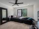 Bedroom featuring neutral decor, a beanbag chair, a black bed, and plenty of light at 140 Robin Rd, Lincolnton, NC 28092